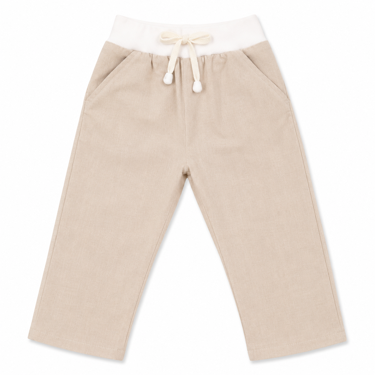A pair of beige children's pants with an elastic white waistband and a cream-colored drawstring tie, shown flat on a white background.