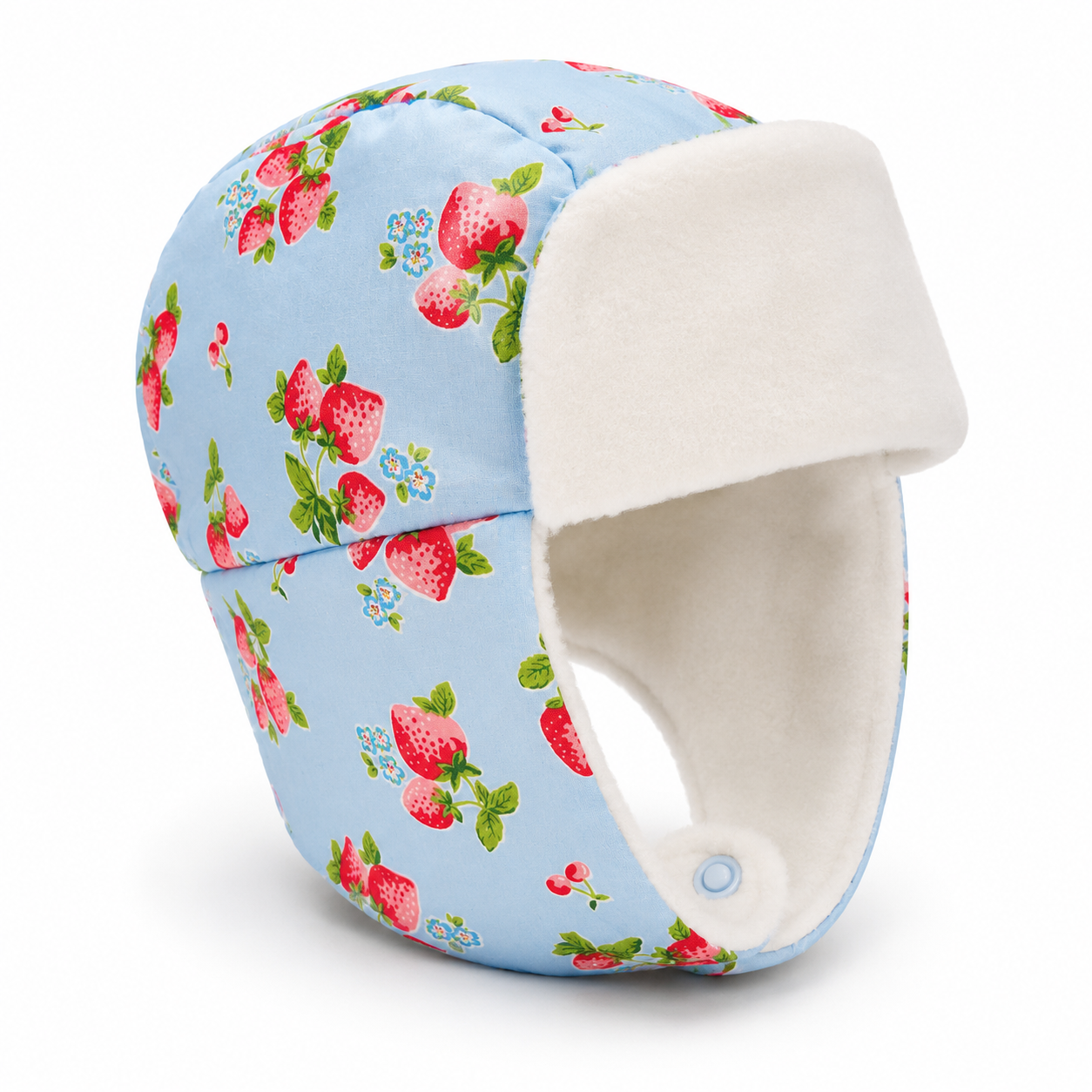 A light blue trapper hat with a red strawberry and green leaf pattern, featuring a soft white fleece ear flap and lining, shown on a white background.