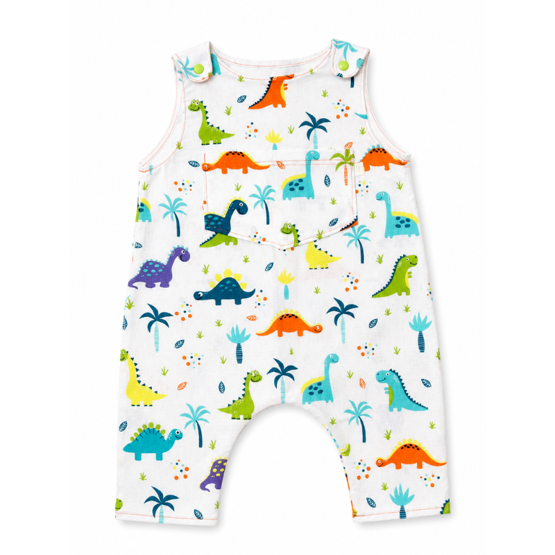 A white sleeveless baby romper with an all-over colorful dinosaur print, featuring green, blue, orange, and purple dinosaurs with small palm trees and dots.