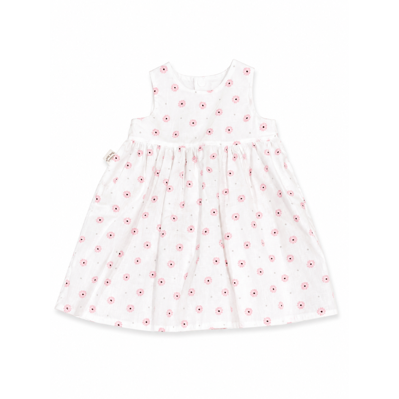A sleeveless white baby dress with a small pink and red floral print, featuring a gathered waist and a small bow on the side, shown against a plain white background.